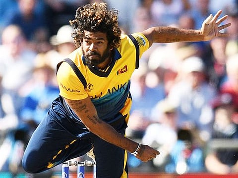 Sri Lanka's Lasith Malinga bowls during the World Cup group stage match against England at Headingley in Leeds, on June 21, 2019.  