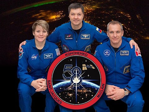 Anne McClain,  David Saint-Jacques and Oleg Kononenko