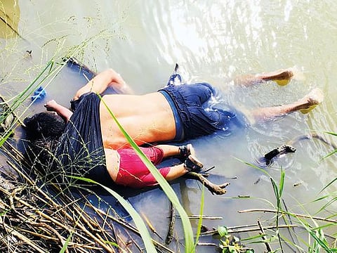 The bodies of a Salvadorean migrant and his daughter at the Rio Bravo river in Matamoros, Mexico, on Monday. 