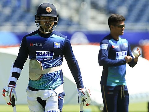Sri Lanka's Milinda Siriwardana (L) takes part in a training session at the Riverside Ground, in Chester-le-Street, northeast England on June 27, 2019. 