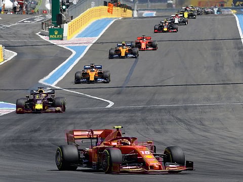 Ferrari driver Charles Leclerc, bottom, of Monaco, steers his car during the French Formula One Grand Prix at the Paul Ricard racetrack in Le Castellet, southern France.
