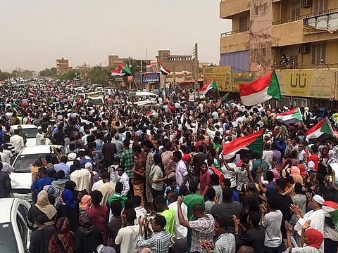 Sudanese protestors chant slogans demanding civilian rule on June 30, 2019 during a rally in Khartoum's southern al-Sahafa district. 