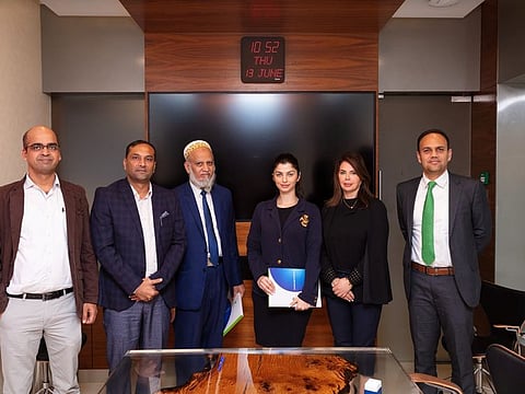Dr Chandra Shekhar, Deputy Director Administration at Zulekha Hospital and Zarmina Jafar, Head of Strategy at The Health Bank, and other officials at the MoU singing ceremony in Dubai