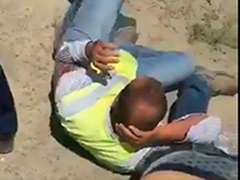 A video grab of one of the CCC employees being beaten.