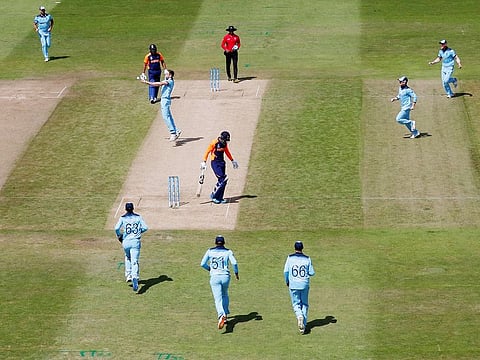 England's Chris Woakes celebrates taking the wicket of India's KL Rahul during the match at Edgbaston, Birmingham. 