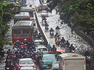 Heavy rains batter India's Mumbai, disrupting air, rail traffic