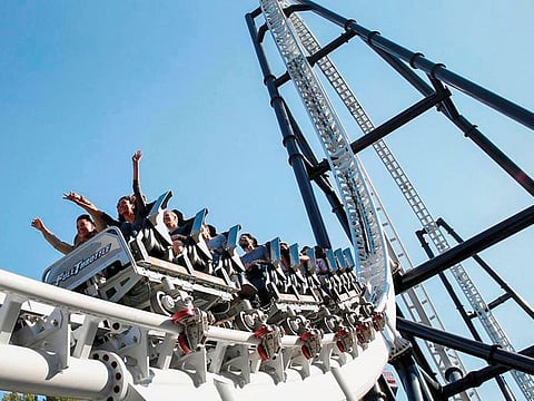 Visitors at Six Flags Magic Mountain in Valencia, California. DXB Entertainments will make a payment to Six Flags as part of a settlement agreement.