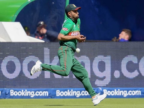 Bangladesh's Tamim Iqbal drops a catch from India's Rohit Sharma during their World Cup group stage match at Edgbaston in Birmingham. 