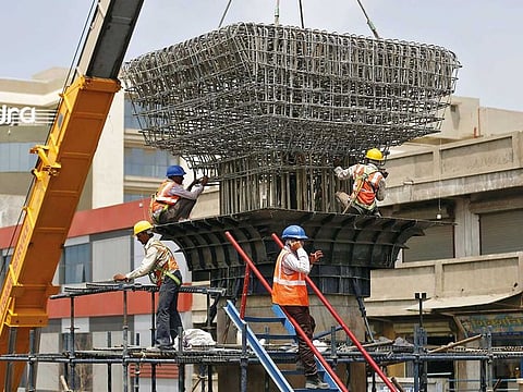 Government does not have the leeway to engage in massive spending to jolt the economy into higher growth. File picture of work in progress at a site of a metro flyover in Ahmedabad. 