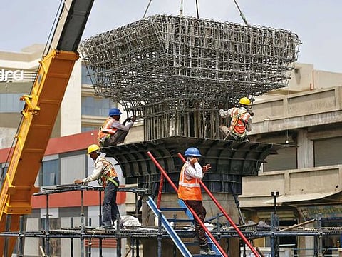 Government does not have the leeway to engage in massive spending to jolt the economy into higher growth. File picture of work in progress at a site of a metro flyover in Ahmedabad. 