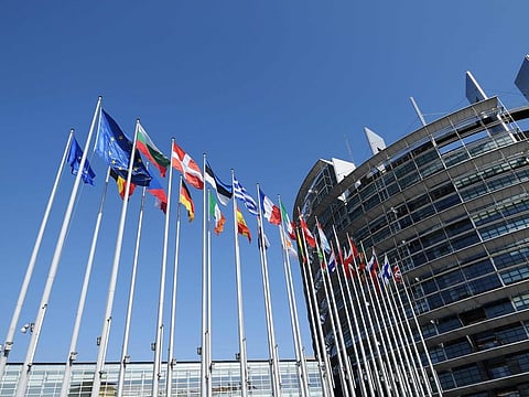 Flags of European Union's countries fly in front of Louise Weiss building (R), headquarters of the European Parliament in Strasbourg, eastern France, in Strasbourg.