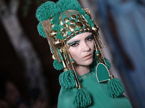 A model wears a creation for the Valentino Haute Couture Fall-Winter 2020 fashion collection presented in Paris, Wednesday, July 3 2019.