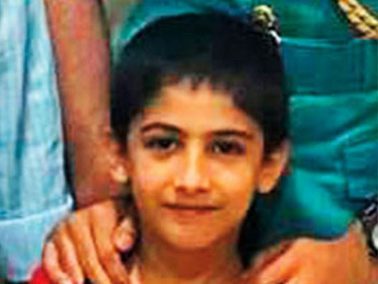 A police officer with the boy and his father-0121