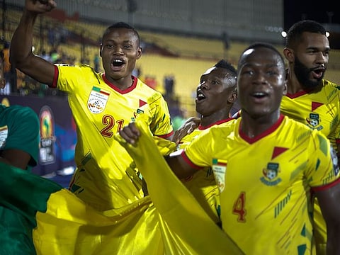 Benin players celebrate after the African Cup of Nations round of 16 soccer match between Morocco and Benin in Al Salam stadium in Cairo, Egypt, Friday, July 5, 2019. 