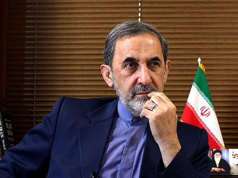 In this Aug. 18, 2013, file photo, Ali Akbar Velayati, a top adviser to Iran's supreme leader Ayatollah Ali Khamenei, gives an interview to The Associated Press at his office in Tehran, Iran.