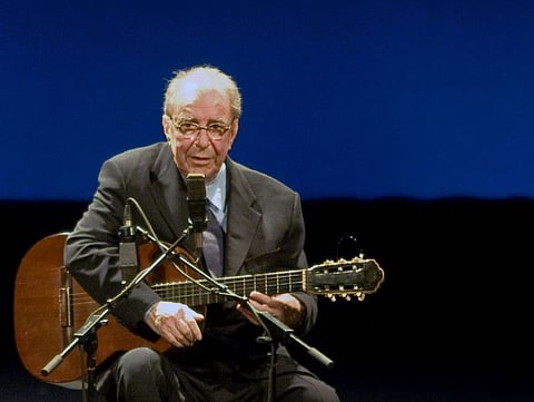 In this file photo taken on August 24, 2008, Brazilian musician Joao Gilberto, 77, acknowledges the audience during his presentation at the Teatro Municipal in Rio de Janeiro. 