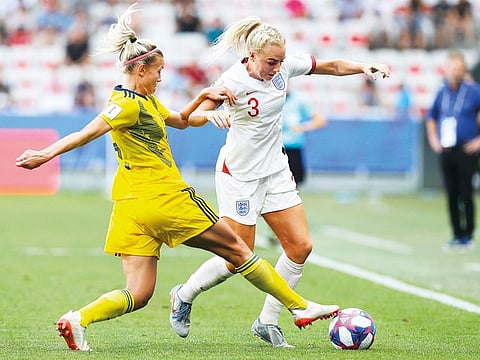 Sweden's Hanna Glas, left, and England's Alex Greenwood challenge for the ball during the Women's World Cup third place soccer match between England and Sweden at Stade de Nice, in Nice, France.