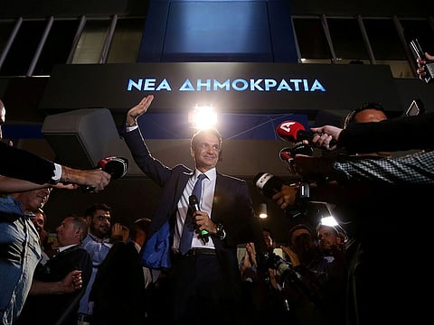 New Democracy conservative party leader Kyriakos Mitsotakis waves as he speaks outside party's headquarters, after the general election in Athens, Greece, July 7, 2019. 