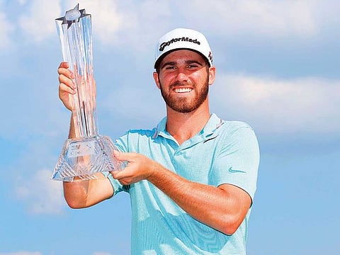 Matthew Wolff of the United States poses for a photo with the trophy after winning the 3M Open at TPC Twin Cities on July 07, 2019 in Blaine, Minnesota.
