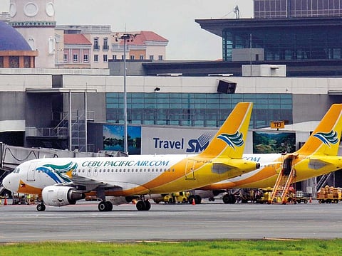 Cebu Air Inc planes parked at Ninoy Aquino International Airport Terminal 3 in Manila, Philippines.