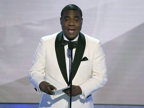 Tracy Morgan presents the award for outstanding performance by an ensemble in a comedy series at the 25th annual Screen Actors Guild Awards at the Shrine Auditorium & Expo Hall on Sunday, Jan. 27, 2019, in Los Angeles. (Photo by Richard Shotwell/Invision/AP)