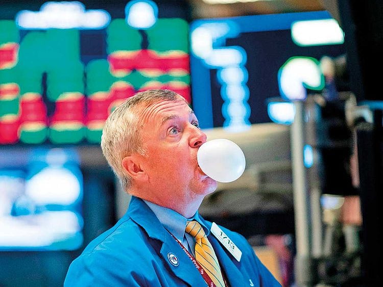 A trader at the New York Stock Exchange