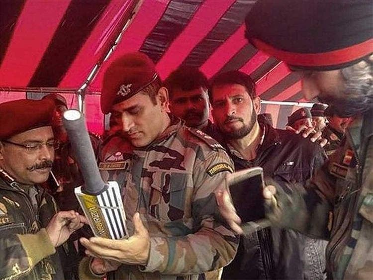 Image of MS Dhoni signing bat in south Kashmir goes viral