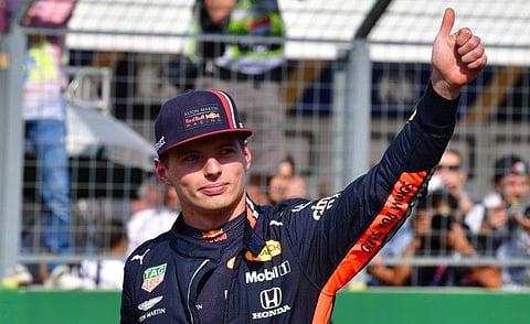 Red Bull's Max Verstappen gives his thumb up after securing his first ever pole position in Hungarian Grand Prix. 
