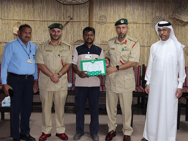 Dubai Police honoured Ali Abdul Raheem, an administrative officer, for returning Dh210,000.