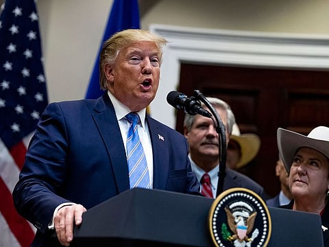 President Donald Trump speaks during a news conference on trade with the European Union in the Roosevelt Room of the White House in Washington.