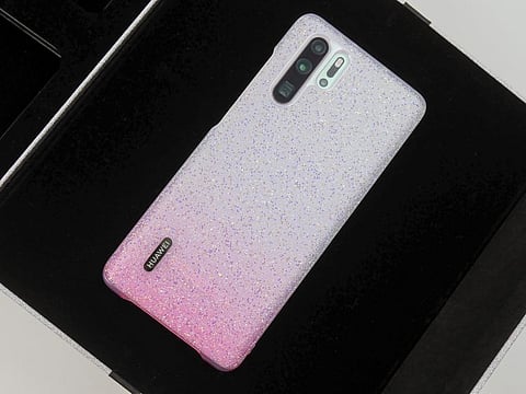 The Huawei P30 Pro Pearl White Edition with the glamorous case on