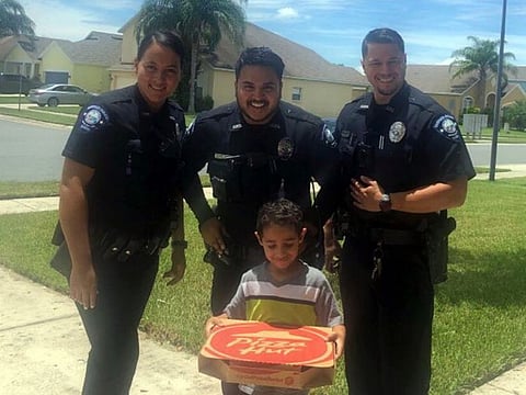 Three officers responded to the home in suburban Orlando for a well-being check. 