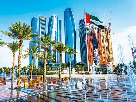 Office towers in Abu Dhabi. Output prices were reduced for the tenth successive month in July, with the pace of decline remaining modest. Picture for illustrative purposes only.