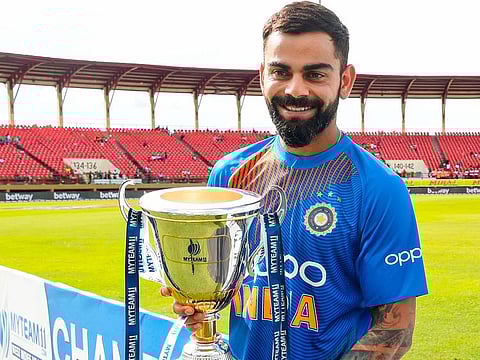 Virat Kohli holds the winning trophy at the end of the 3rd T20i match between West Indies and India at Guyana National Stadium in Providence, Guyana, on August 6, 2019. 