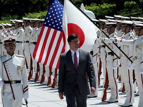 U.S. Secretary of Defense Mark Esper inspects an honor guard ahead of a meeting with Japanese Defense Minister Takeshi Iwaya at the Ministry of Defense in Tokyo, Japan August 7, 2019. 