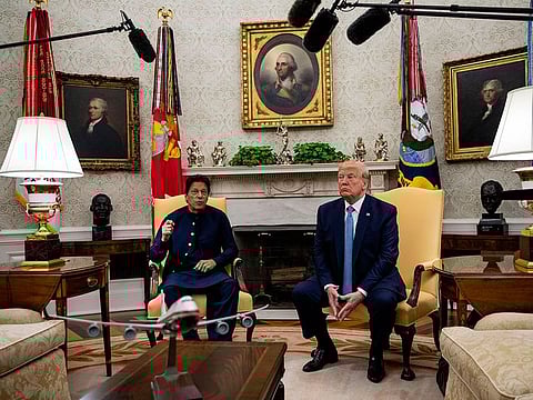 Prime Minister Imran Khan of Pakistan speaks to reporters during a meeting with President Donald Trump in the Oval Office of the White House, in Washington on Monday, July 22, 2019. 
