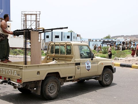 Members of southern Yemeni separatist forces patrol a road during clashes with government forces in Aden, Yemen, on  August 10, 2019.