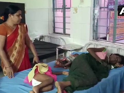 An image of the woman and her children at a hospital in Bihar
