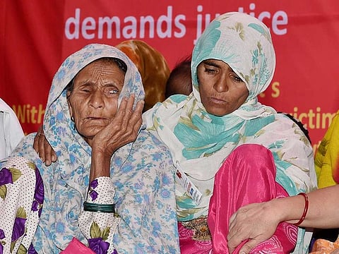 In this April 19, 2017 photo Alwar lynching victim Pehlu Khan's mother Ankuri Begum (L) is seen at a dharna demanding justice for her son, at Jantar Mantar in New Delhi.  An Alwar court on Wednesday acquitted all six accused in the lynching of Pehlu Khan, killed two years ago by a mob that set upon him while he was transporting cows. 