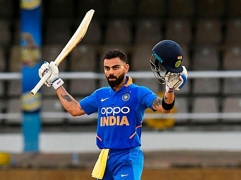Virat Kohli of India celebrates his century during the 3rd ODI match between West Indies and India at Queens Park Oval, Port of Spain, Trinidad and Tobago, on August 14, 2019. 