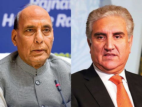 Rajnath Singh, Indian Defence Minister [L] and Shah Mehmood Qureshi, Pakistan Foreign Minister [R]