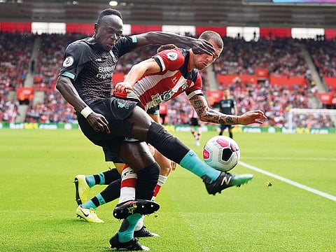 Liverpool’s Sadio Mane (left) fights for possession with Southampton’s Pierre-Emile Hojbjerg at St Mary’s Stadium in Southampton.