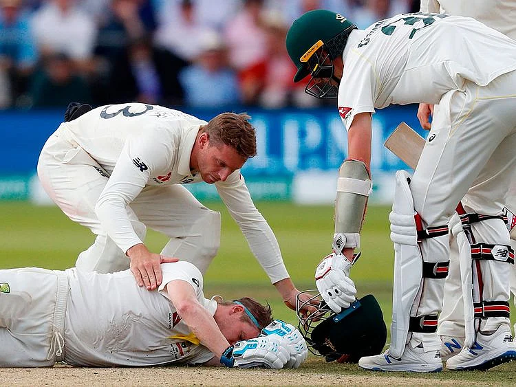 Australia's Steve Smith lays on the pitch