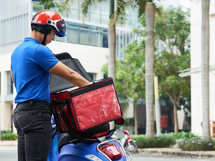 Food delivery guy stock