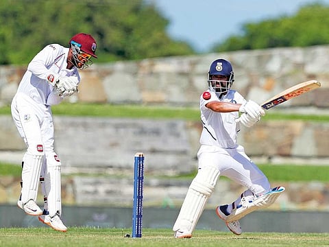 India’s Ajinkya Rahane plays a shot square of the wicket on the first day of the first Test against the West Indies at  Sir Vivian Richards Cricket Ground in Antigua.