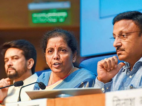 India’s Finance Minister Nirmala Sitharaman, flanked by Minister of State for Finance Anurag Thakur (left) and finance secretary Rajiv Kumar, at a press conference in New Delhi.