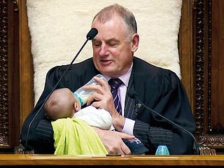 New Zealand MP goes viral after bottle-feeding baby in parliament