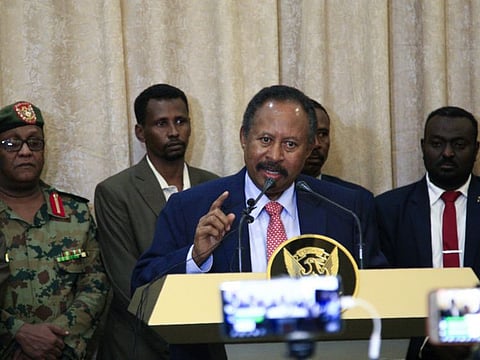 Abdullah Hamdok speaks after being sworn in as Sudan's interim prime minister in Khartoum on August 21, 2019.