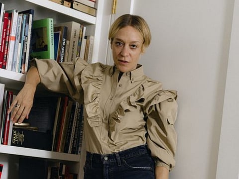 The actress Chloë Sevigny at her home in New York, Aug. 2, 2019. Sevigny, the art house queen and fashion muse, has some things to say about a red lip, unruly brows and how she gave a cool girl spin to her new rose perfume. (Molly Matalon/The New York Times)
