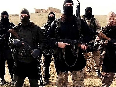 A group of Daesh fighters. According to US and Iraqi military and intelligence officers, the Daesh is gathering new strength, conducting guerrilla attacks across Iraq and Syria, retooling its financial networks and targeting new recruits. 